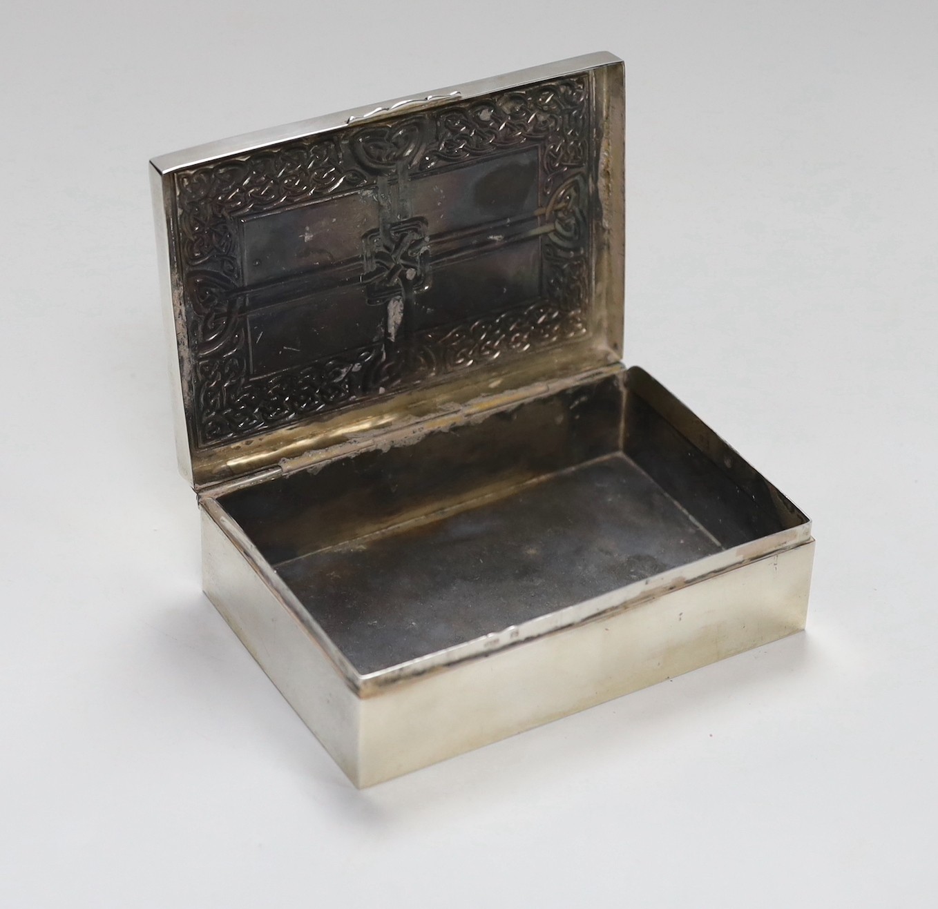 A Scottish white metal Iona rectangular box and cover, with Celtic knot decoration, 13.2cm, 8.7oz, stamped 'Iona AR', for Alexander Ritchie?